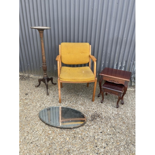 63 - A retro chair, nest of two, frameless mirror, and plant stand