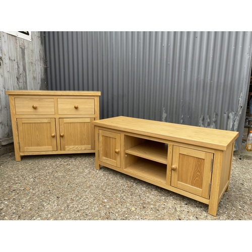 84 - A modern light oak two drawer sideboard together with a tv stand