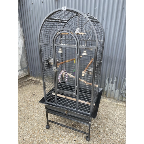 92 - A grey floor standing bird cage 160 tall 70 wide