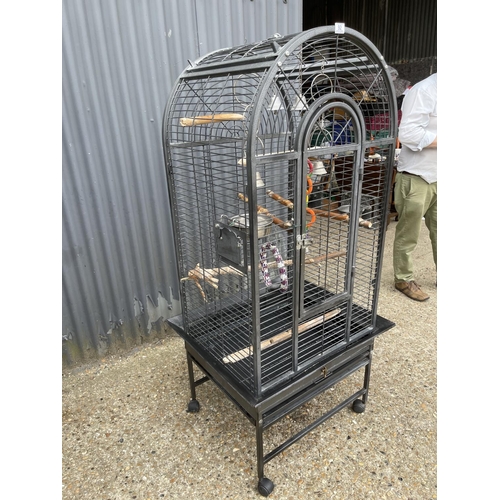 92 - A grey floor standing bird cage 160 tall 70 wide