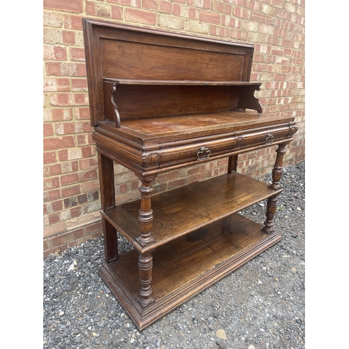 10 - An antique continental walnut two drawer buffet with folding top 115x43x90