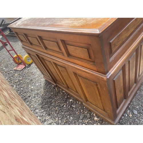 11 - A large good quality American walnut patent roll top desk with fitted interior and 9 locking drawers... 