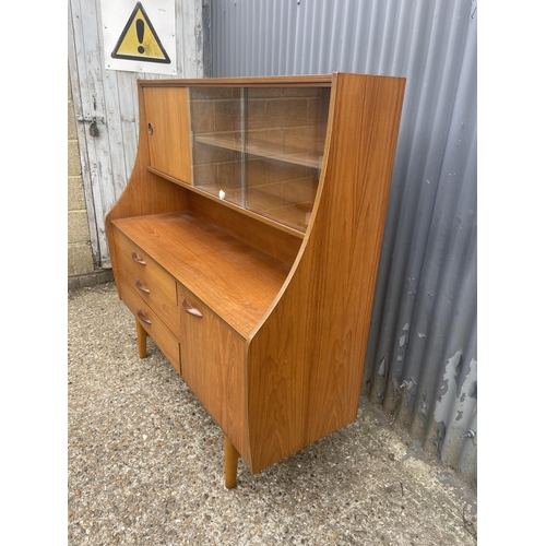 131 - A teak cocktail sideboard by AVALON 135x46x137