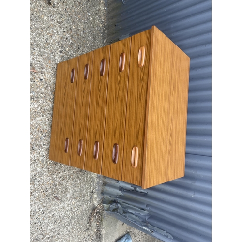 134 - A mid century teak effect chest of drawers 75x44x93