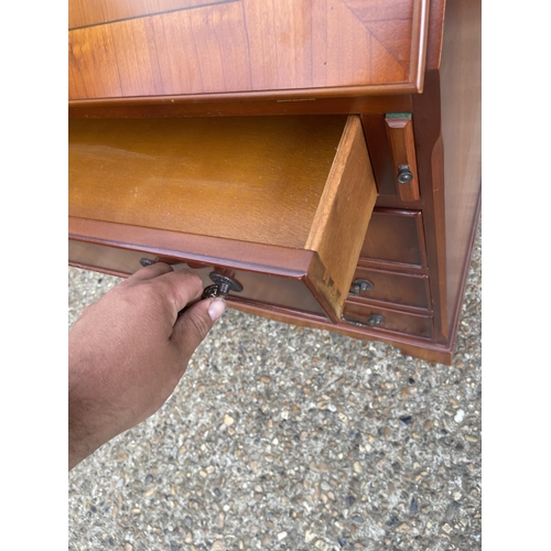 136 - A reproduction yew bureau