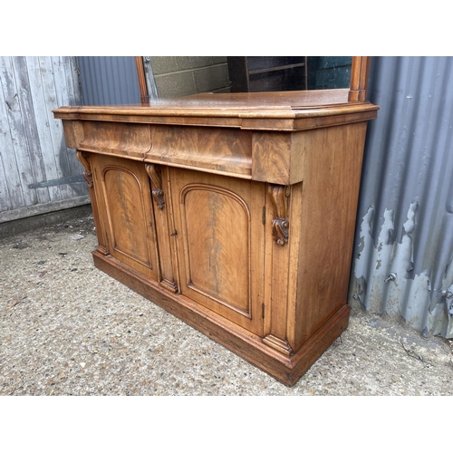 143 - A Victorian mahogany two drawer and door mirror back sideboard 135cm wide