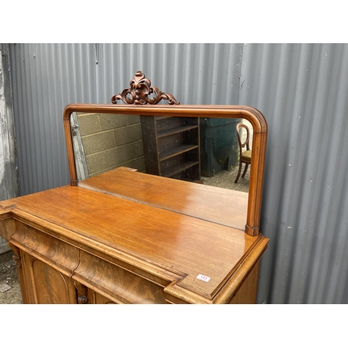 143 - A Victorian mahogany two drawer and door mirror back sideboard 135cm wide