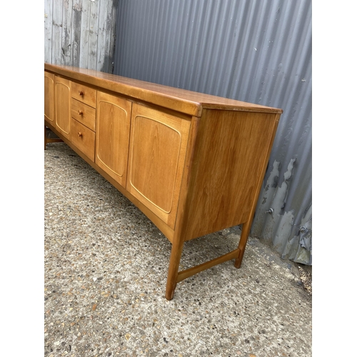 167 - A mid century teak sideboard by Nathan 214cm long