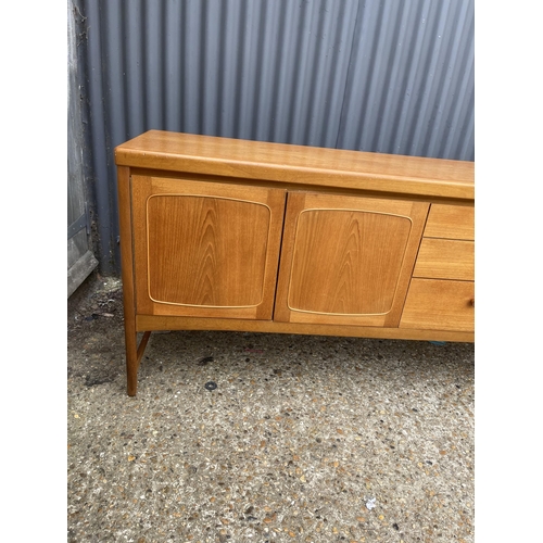 167 - A mid century teak sideboard by Nathan 214cm long