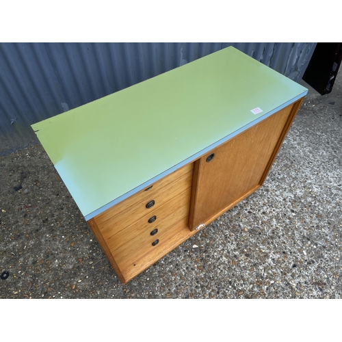 177 - A retro formica topped combination sideboard