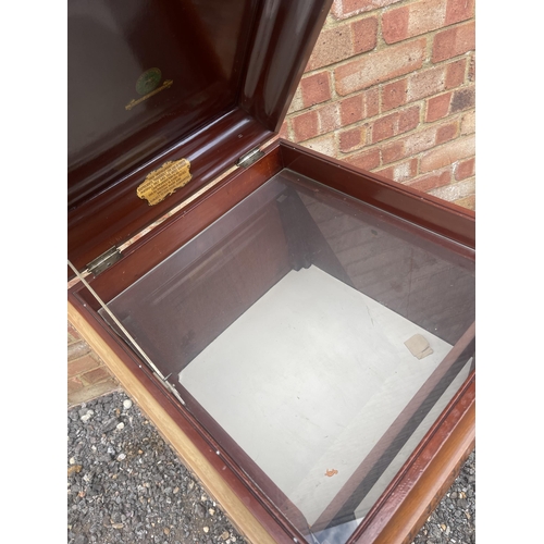 18 - A mahogany gramophone cabinet converted to display case with glass top