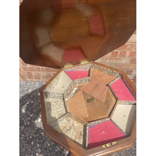 19 - A Victorian burr walnut trumpet workbox with fitted interior