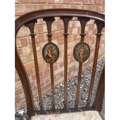 20 - A pair of Hepplewhite style Victorian mahogany chairs with painted panels in the backs