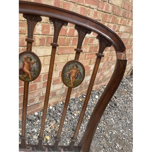 20 - A pair of Hepplewhite style Victorian mahogany chairs with painted panels in the backs