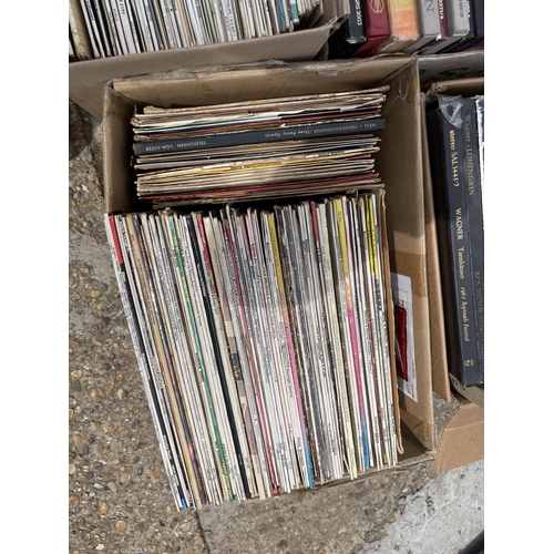 212 - Seven boxes of records and singles