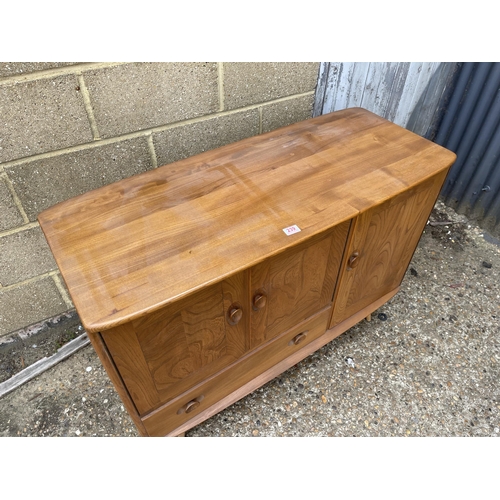 239 - An ercol light elm sideboard