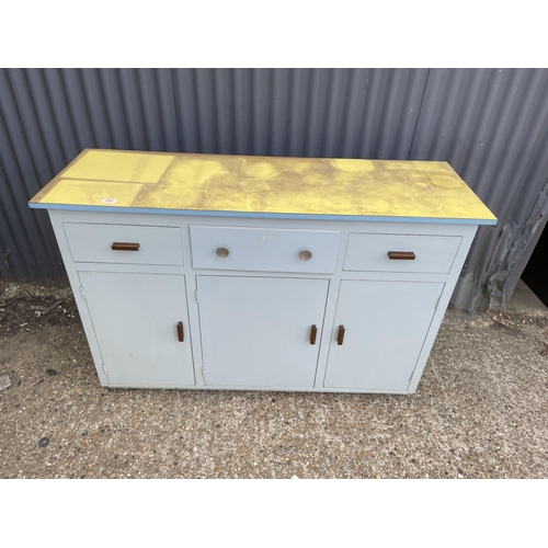 242 - A vintage blue painted sideboard with yellow formica top 138x46x93