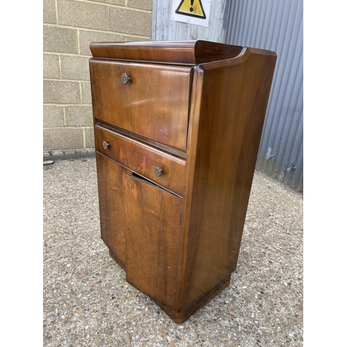 243 - A mid century walnut drinks cabinet