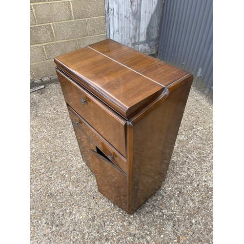 243 - A mid century walnut drinks cabinet