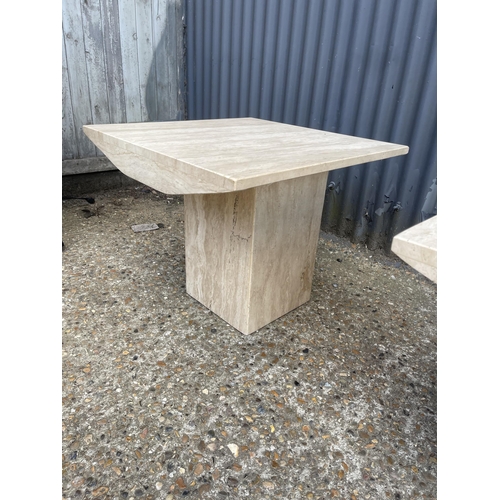 256 - A pair of limestone travertine side tables 60x 60x 50