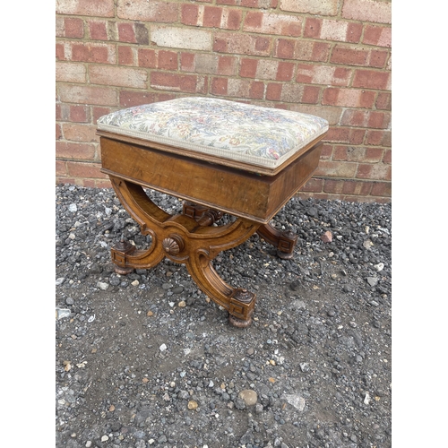 32 - A Victorian walnut x frame ottoman stool