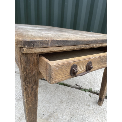 333 - A pine farmhouse table with drawer  152x87x77