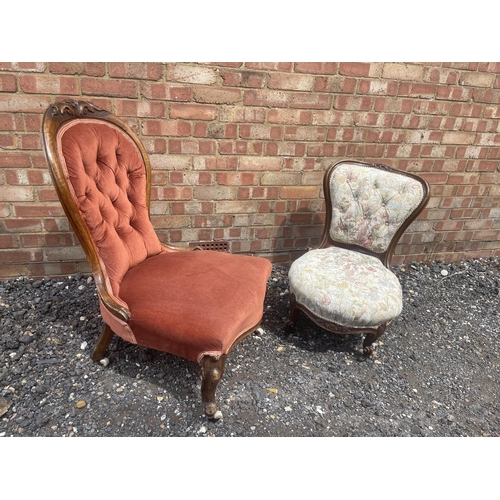 34 - A pink upholstered walnut framed Victorian spoon back Ladies chair together with a Victorian button ... 