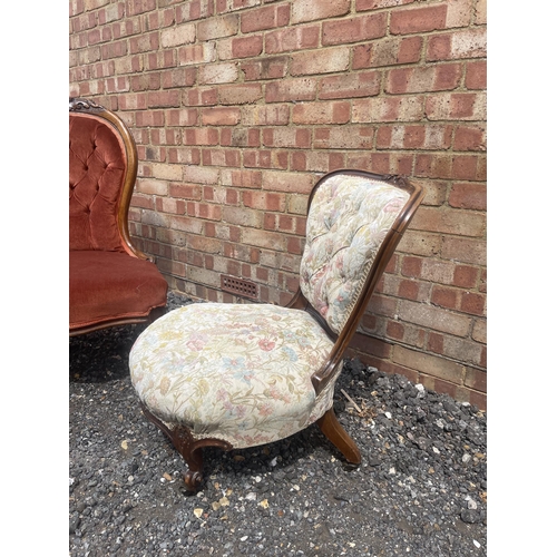 34 - A pink upholstered walnut framed Victorian spoon back Ladies chair together with a Victorian button ... 