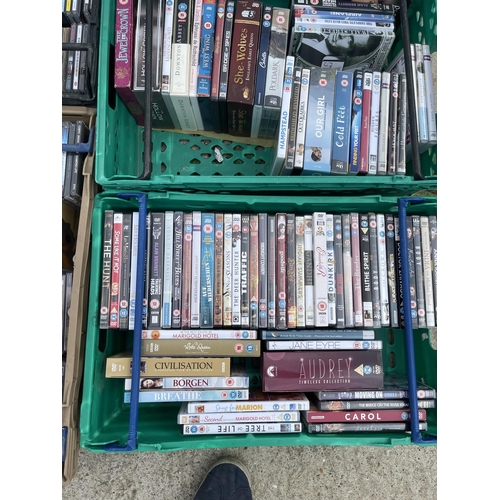 350 - Five trays of assorted DVDS AND cds