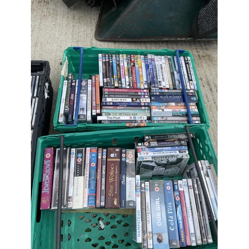 350 - Five trays of assorted DVDS AND cds