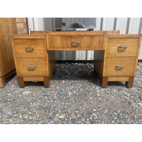 38 - A deco period three piece bedroom suite by HEALS consisting of a chest of five drawers, three drawer... 