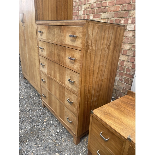 38 - A deco period three piece bedroom suite by HEALS consisting of a chest of five drawers, three drawer... 