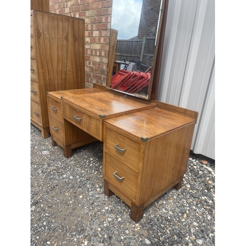 38 - A deco period three piece bedroom suite by HEALS consisting of a chest of five drawers, three drawer... 