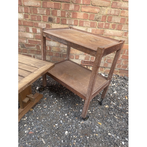 42 - A limed oak tea trolley together with low pine table