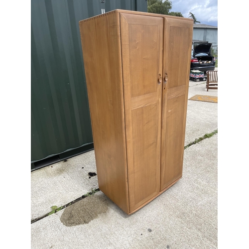 54 - Ercol light elm double wardrobe 90 x 53 x 180 cms