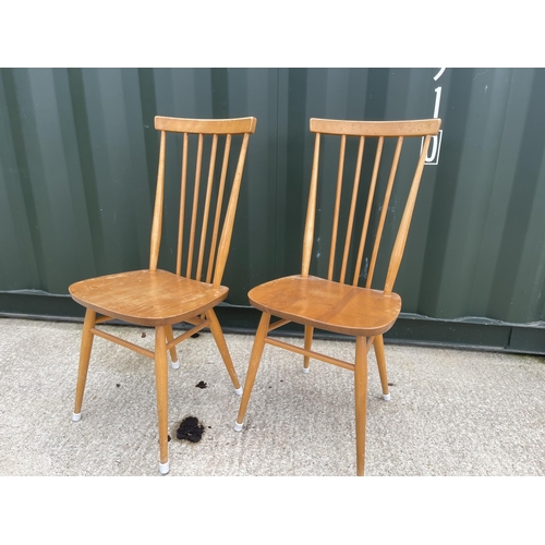 57 - Pair of Ercol stickback dining chairs