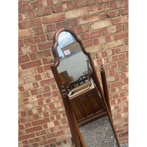 6 - A reproduction mahogany floor standing cheval mirror by BEVAN and funnel