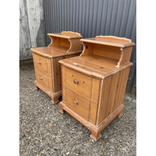 85 - A pair of pine two drawer bedsides