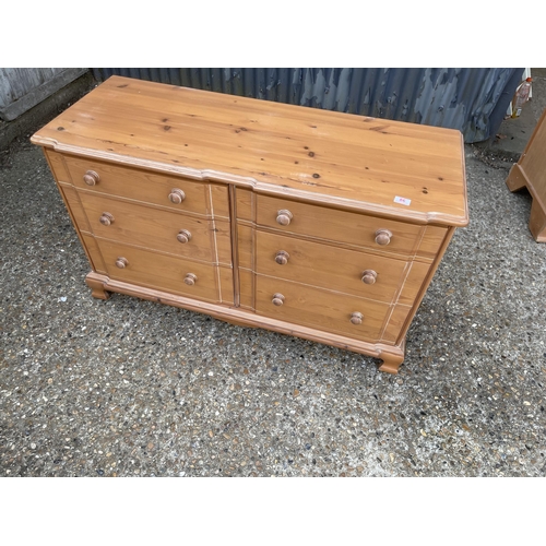 86 - A large pine bank of six drawers 120x46x75