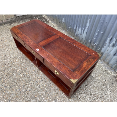 91 - A hardwood military style three drawer coffee table