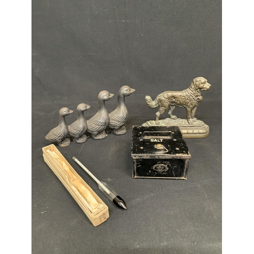 668 - Cast brass dog doorstop and one other, George Nutter & Co dated 1916 salt box and hydrometer