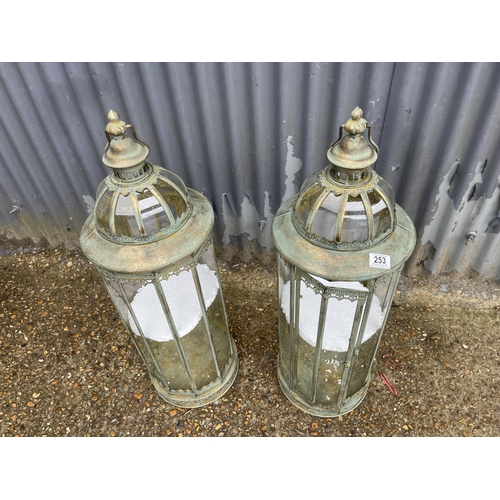 50F - A pair of copper and glass tall candle lanterns 87cm