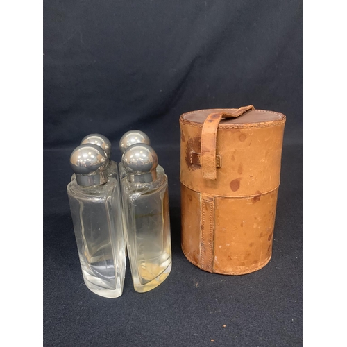 558 - Leather cased 4 bottle flask