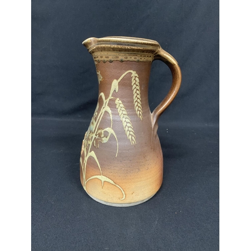 562 - English hops and barley studio pottery jug, height 27cms