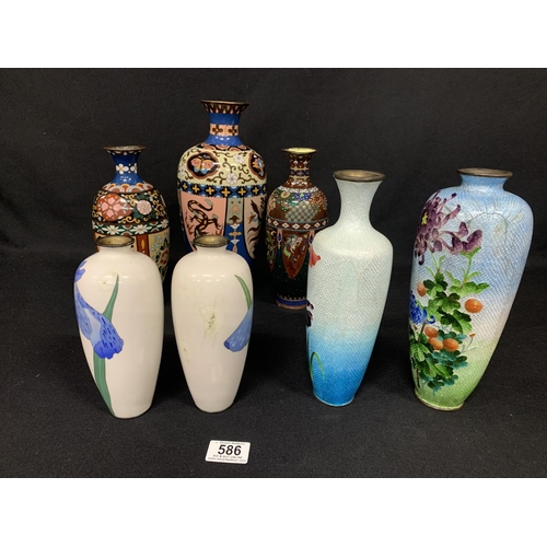 586 - 7 cloisonné enamel vases, tallest 30cms. All with slight damage