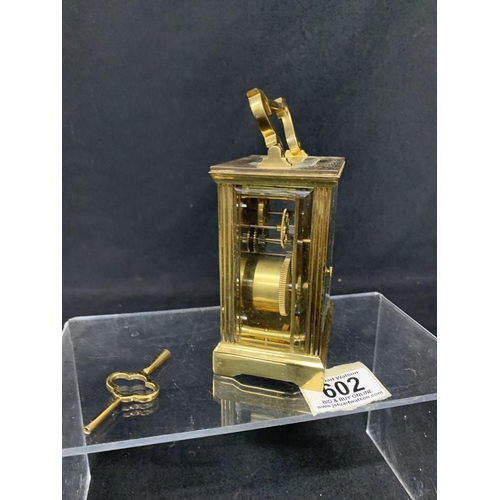 602 - Brass carriage clock with key, by Mappin and Webb, height 12cms, running order