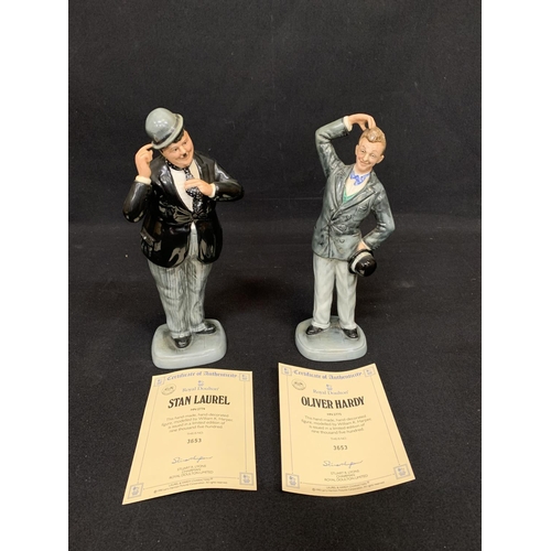 704 - Doulton Stan Laurel and Oliver Hardy figures height 26cms. No damage