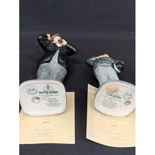 704 - Doulton Stan Laurel and Oliver Hardy figures height 26cms. No damage