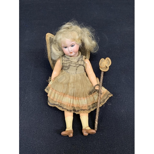 735 - Antique Bisque fairy doll, marked AM Germany, length 25cms