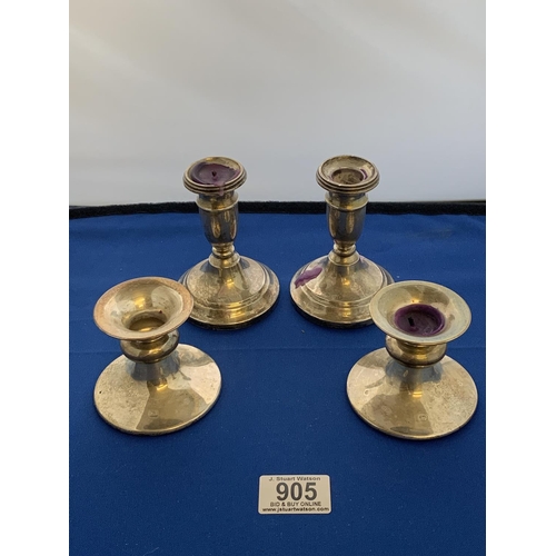 905 - Two pairs of Hallmarked Silver Candlesticks Height  10.5 and 6.5 cms